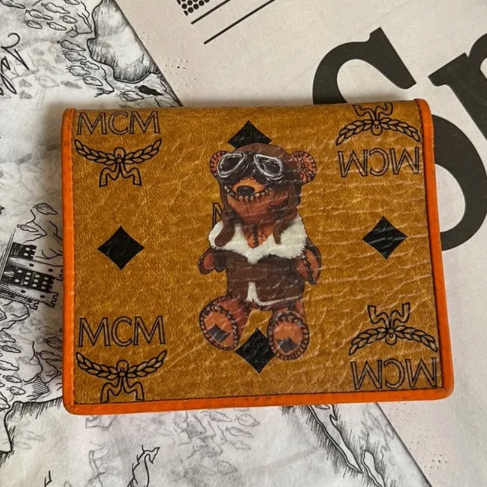 ⛔️SOLD MCM 🐻 bear visetos monogram limited edition bifold snap closure wallet.